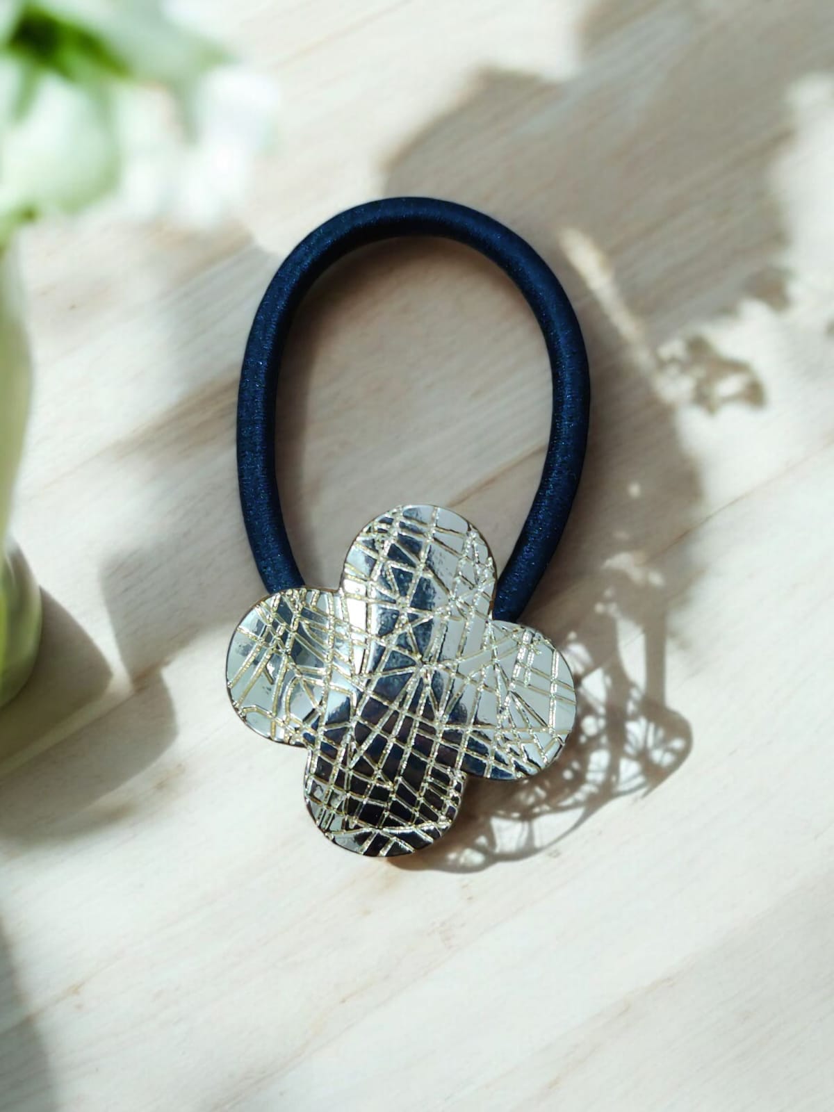 Elegant Gold Flower Hair Tie with Textured Design