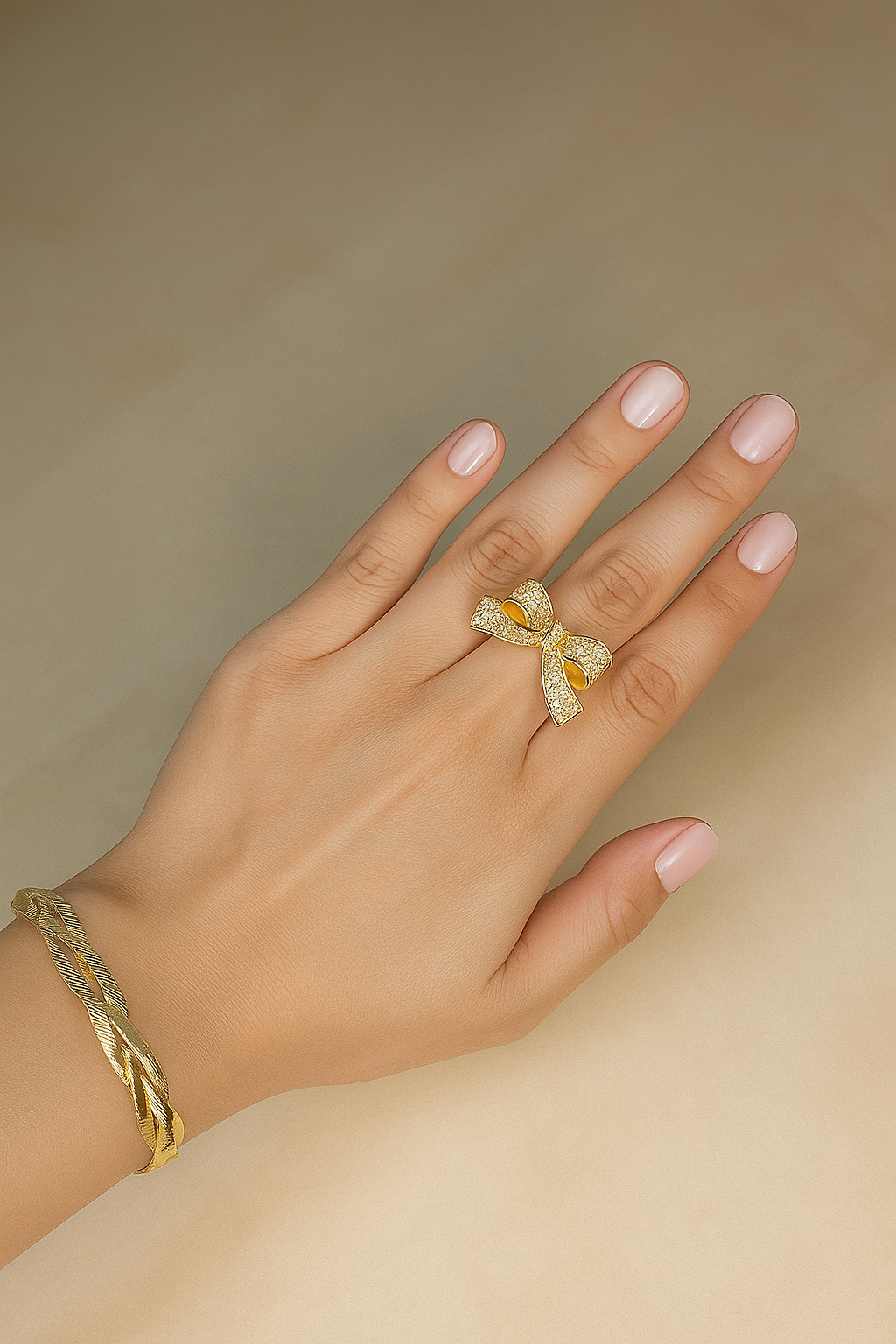 Bow Design Gold Ring with Crystal Embellishments