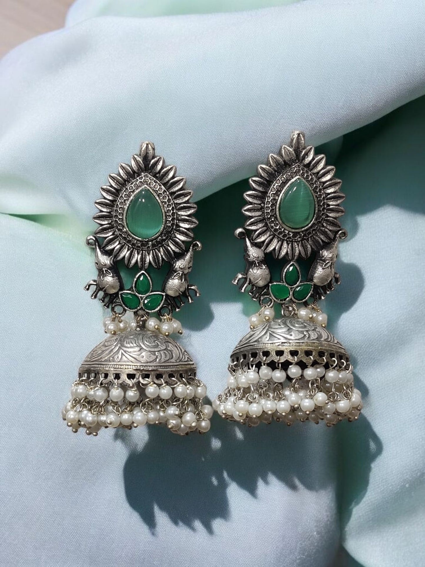Peacock Grace Oxidised Jhumka Earrings – Emerald Essence