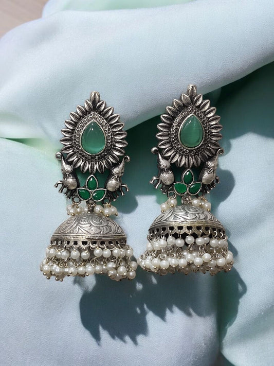 Peacock Grace Oxidised Jhumka Earrings – Emerald Essence