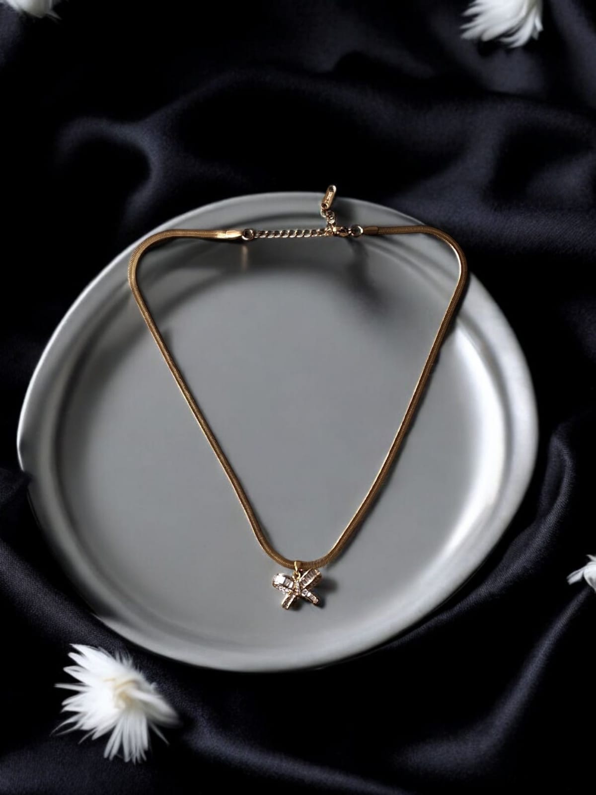 Golden Bow Pendant Necklace with Crystal Accents