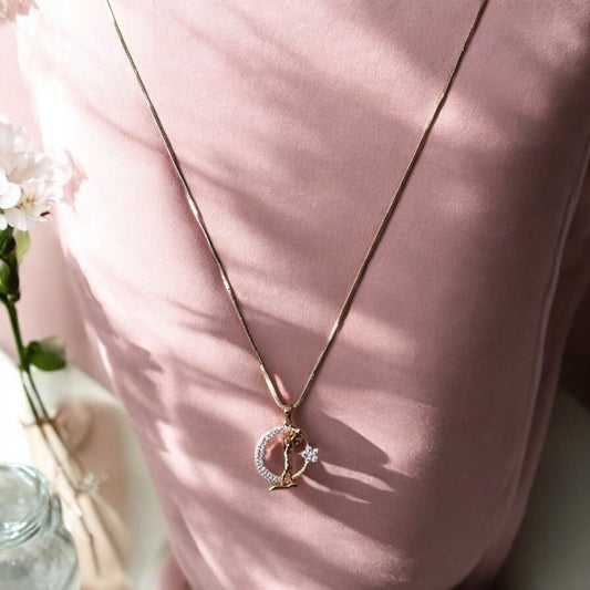 Rose Gold Crescent Moon Pendant with Star Accent